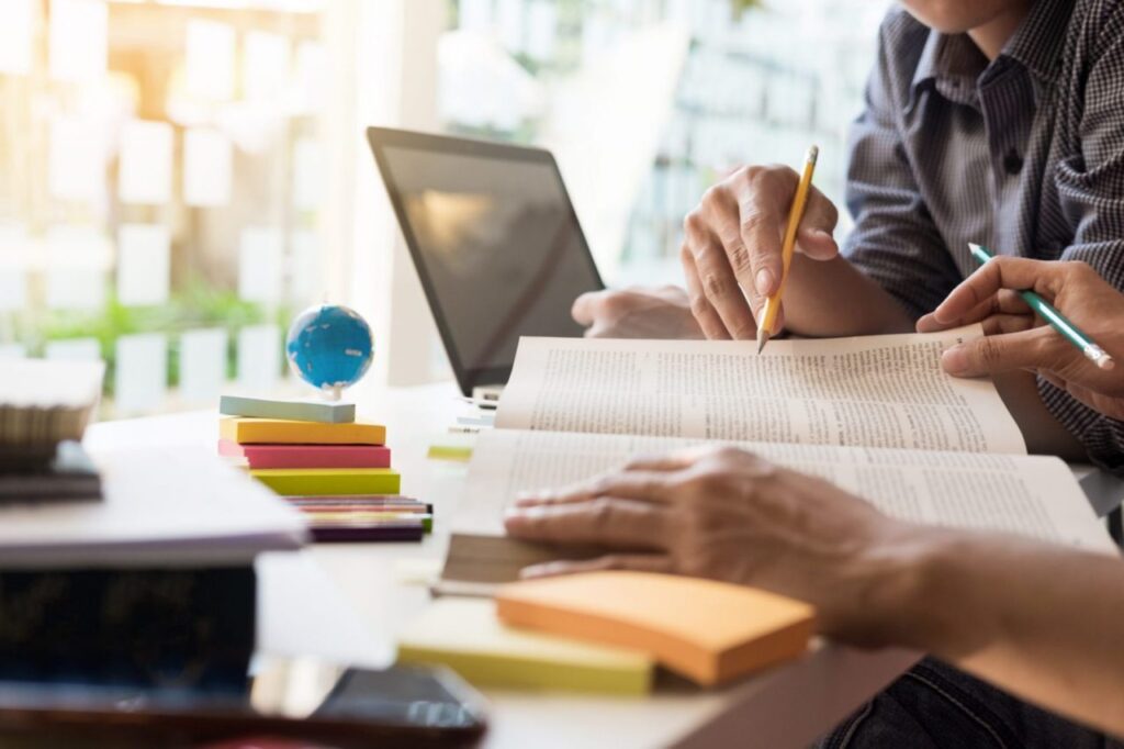 bigstock-Young-Woman-And-Man-Studying-F-192322855
